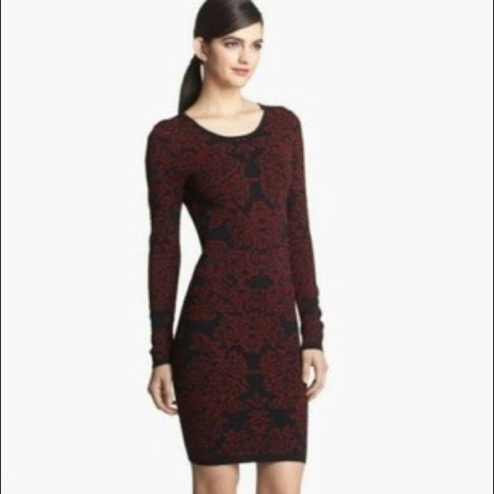 Red and black bodycon dress by Remain. Size Med